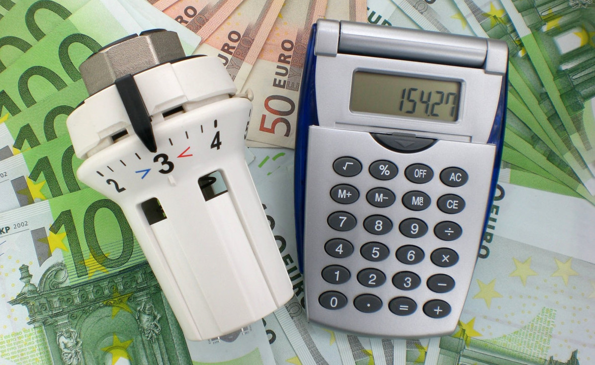 Heizungsregler, Geld, Taschenrechner